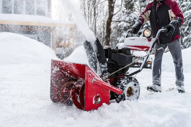 Halifax driveway being cleared by hand after a winter storm
